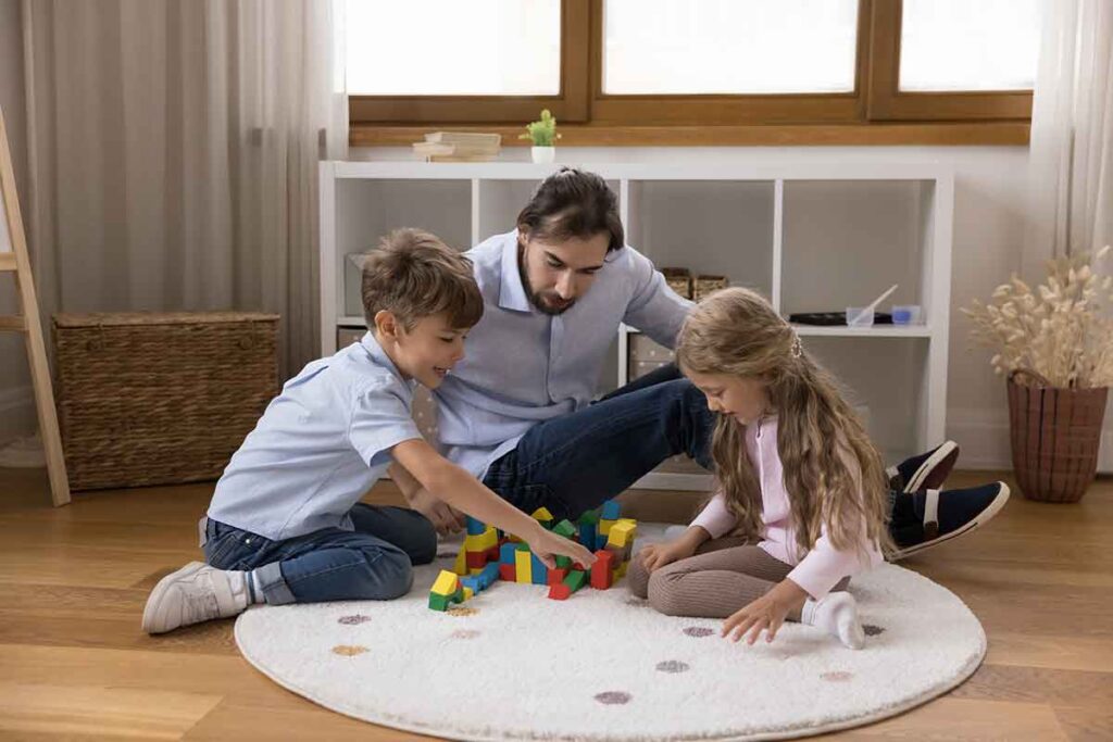 Labeled Praises with Therapist Sthefany Alviar, father teaching his elementary-age son and daughter about sharing with the help of labeled praises